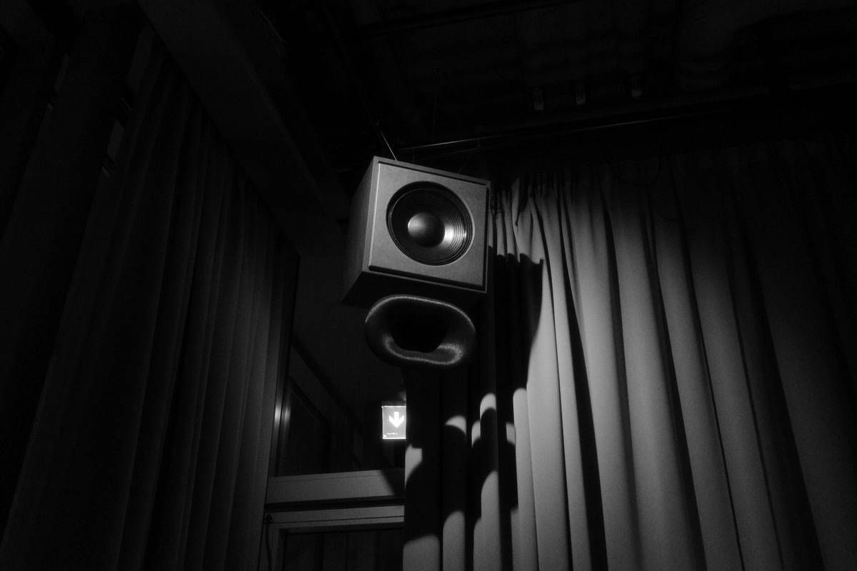 Essential online podcast recording equipment setup including XLR mic, audio interface, and acoustic treatment