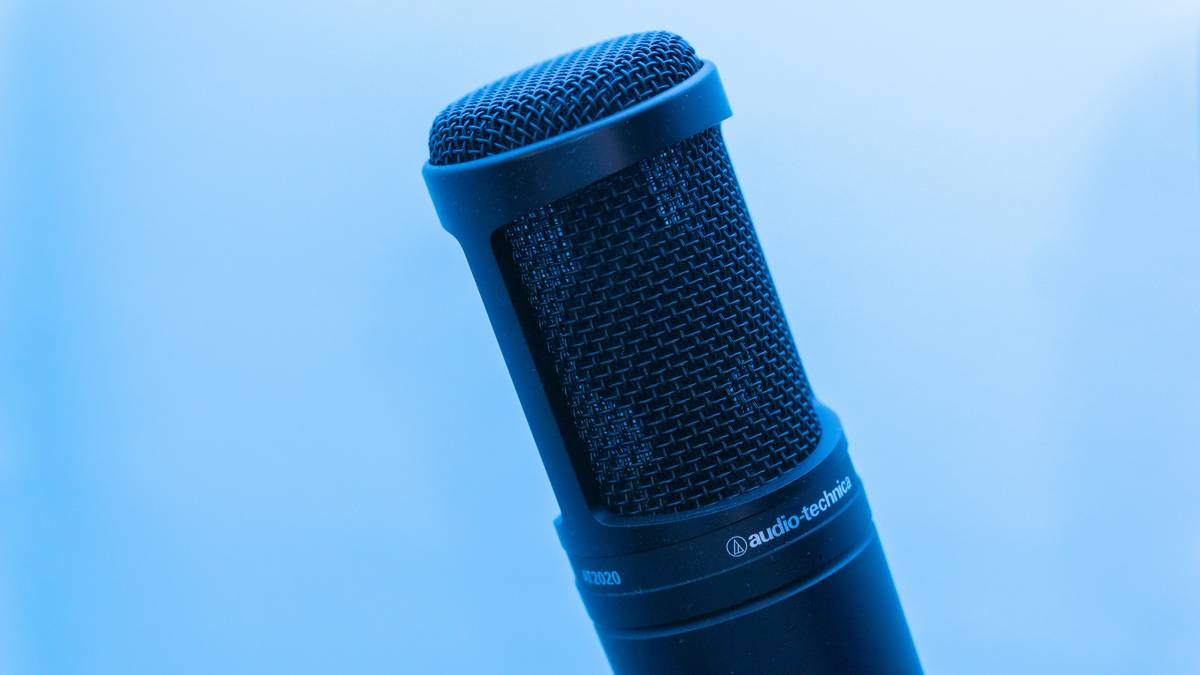 close-up of equipment for podcast beginners including pop filter and shock mount
