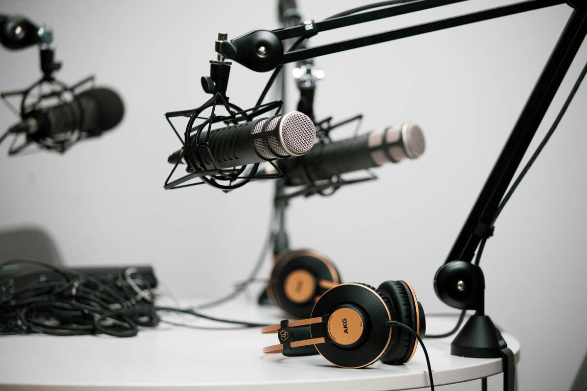 Custom-built podcast studio equipment packages with mic stand, interface, and acoustic panels